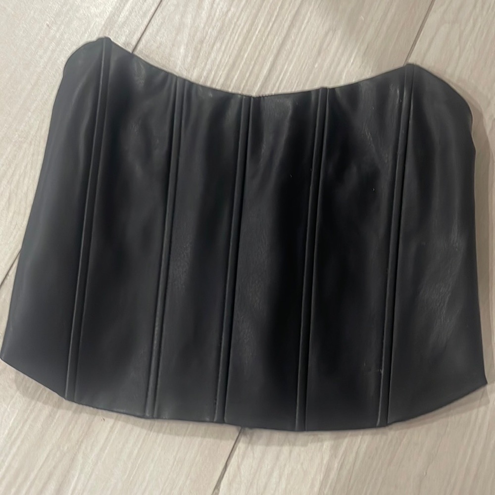 Azkara leather black strapless top with zip in the back. NEW WITH TAGS